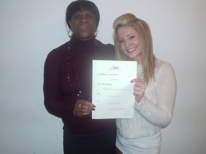 Silk Trends Hair Braiding Course - Happy Student receiving Certicate