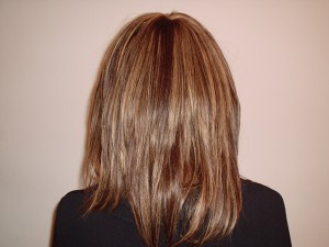 Weave Hair Style with highlights - Back View
